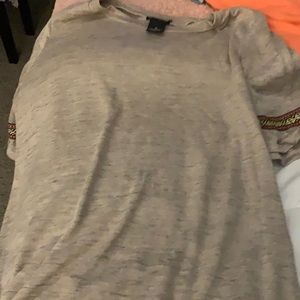 Brown shirt with details on arms